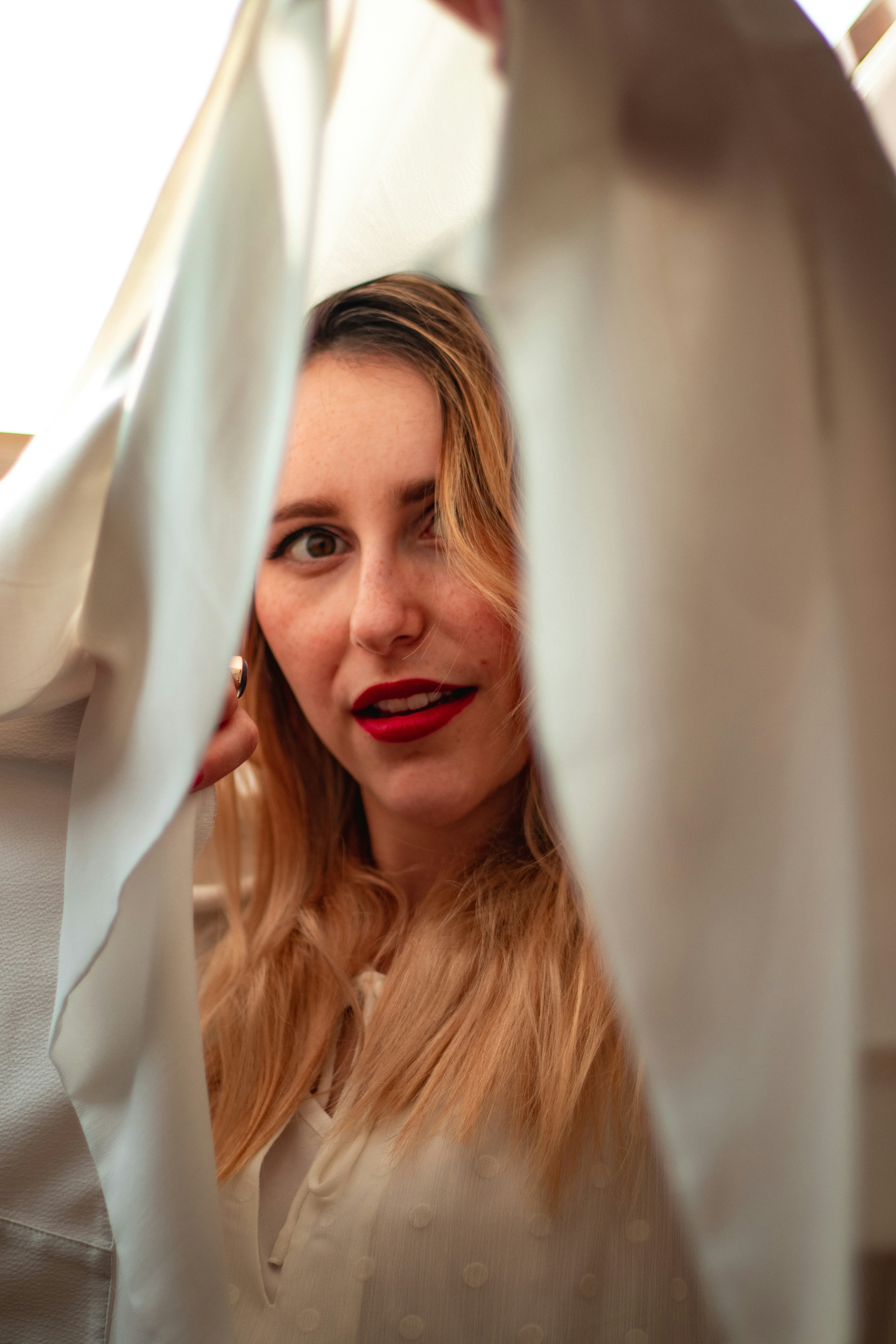 woman in white long sleeve shirt